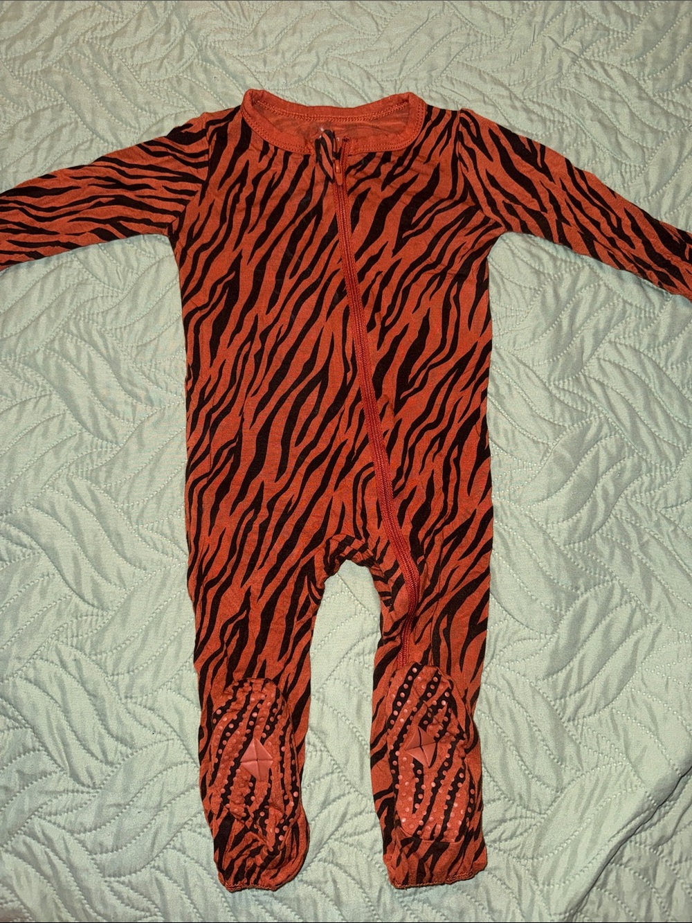 Kyte BABY Orange and Black Zebra-Print Footed One-Piece